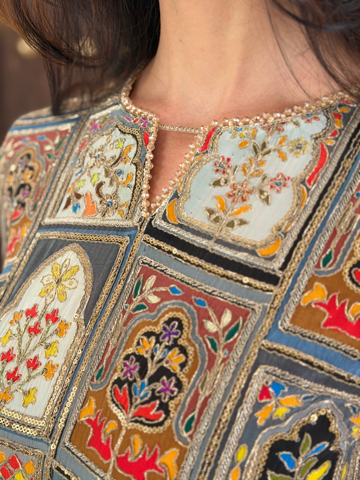 Embroidered grey shirt with gold sequin detailing